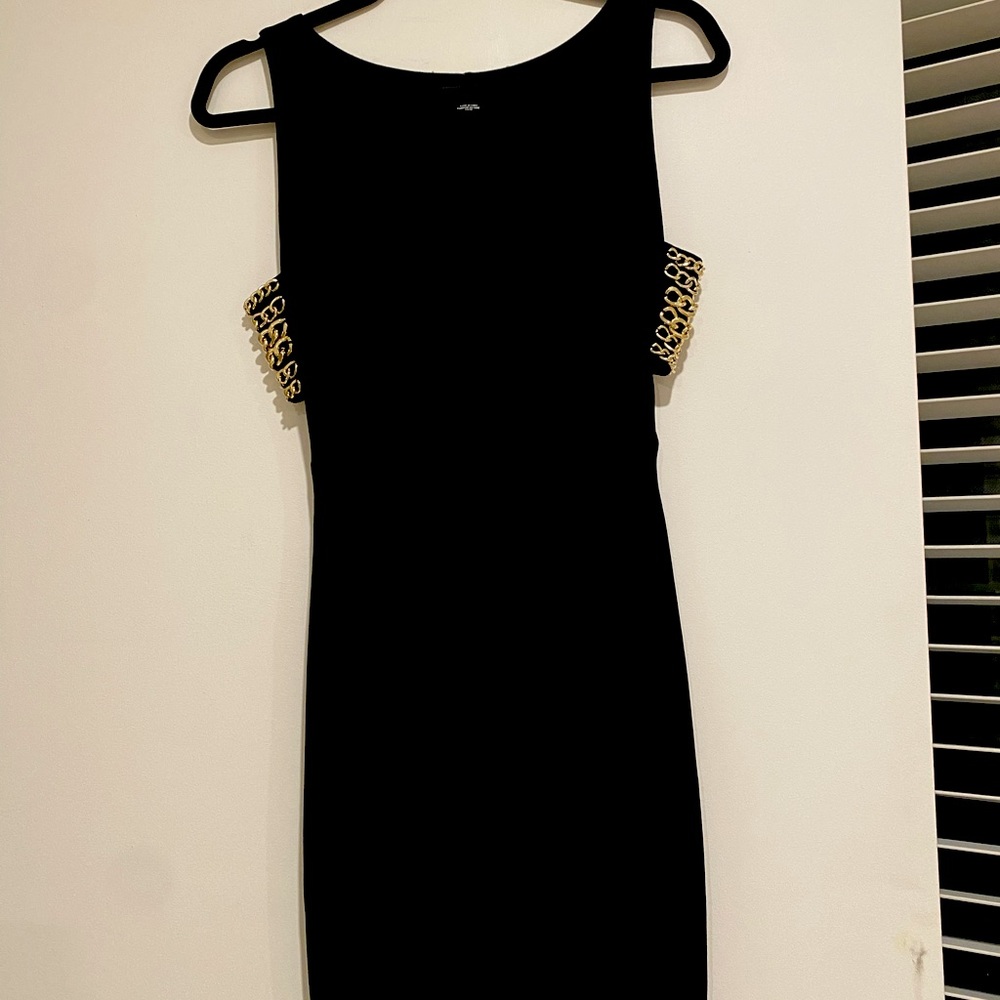 Only worn once, like brand new condition beautiful “little black dress” BEBE